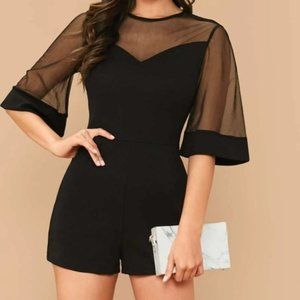 Hot black romper with sheer detailing brand new